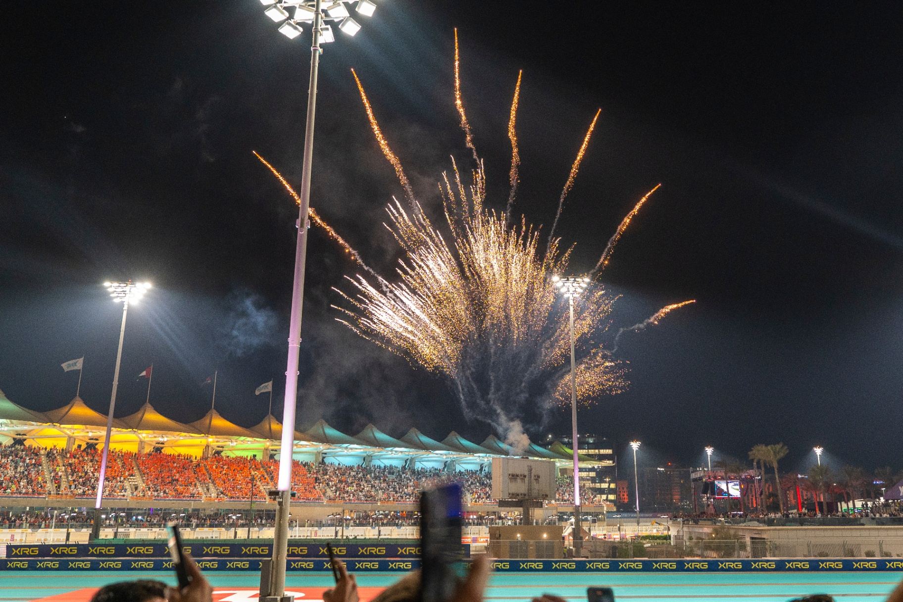 Fireworks bursting over the Yas Marina main grandstand on race day
