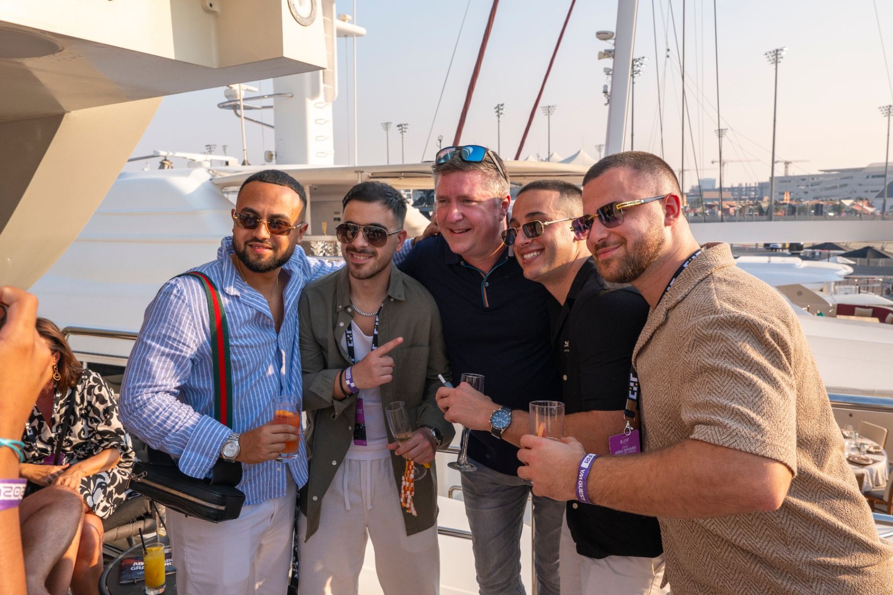 GP Management guests gathered on a superyacht in Yas Marina